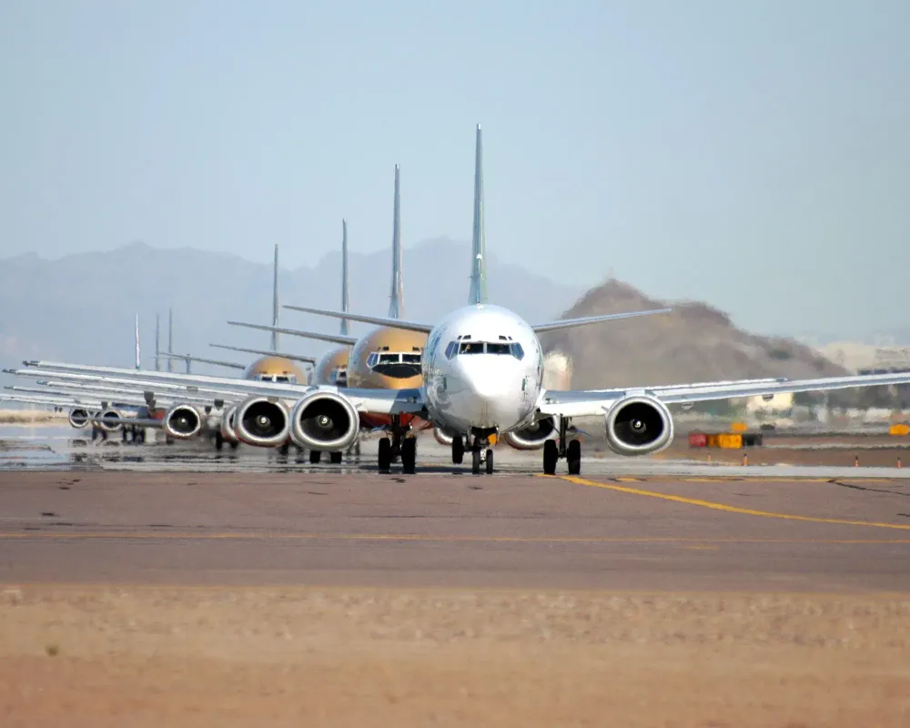 Airplane - Nondescript Row of Planes Airfare Sales